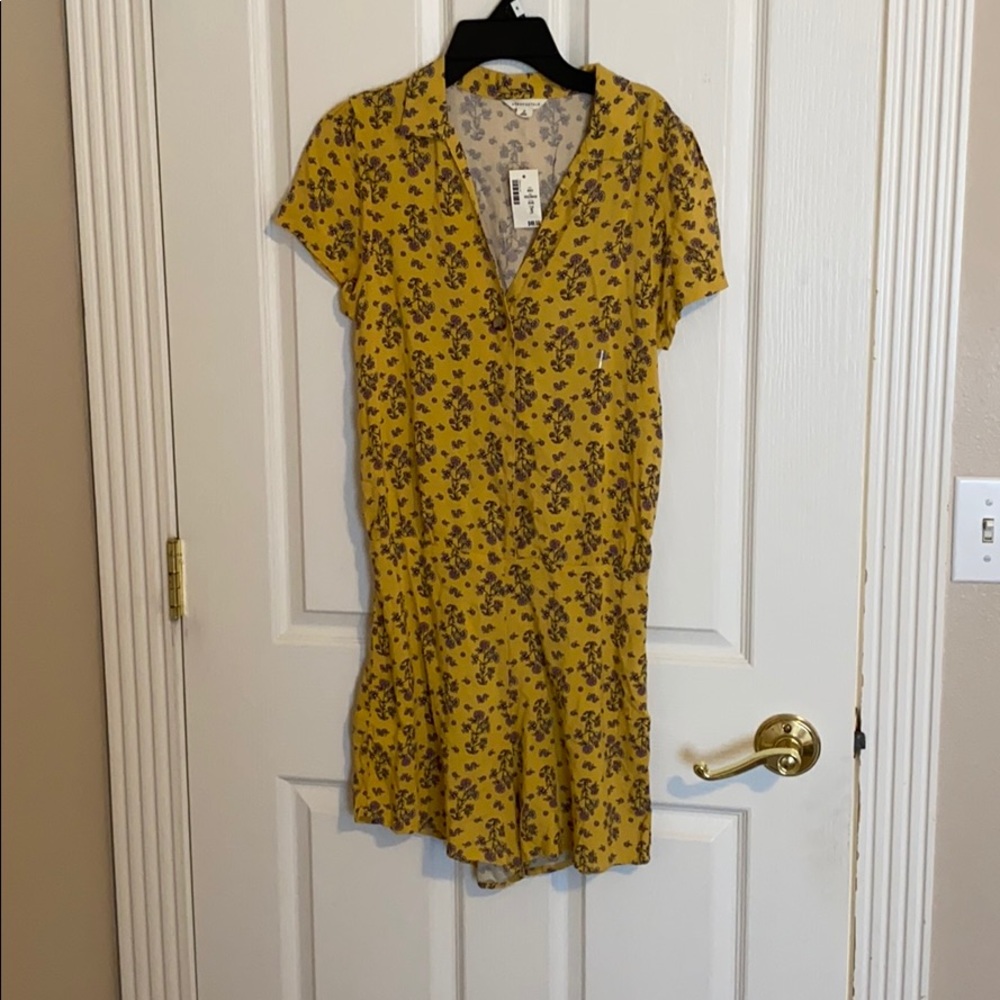 Brand new with tags yellow floral romper jumpsuit